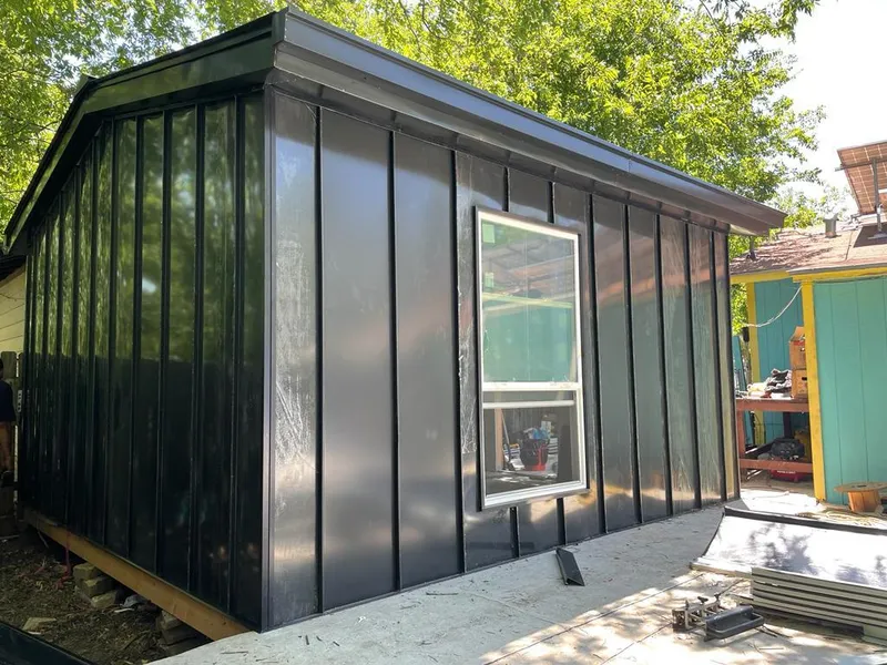 Black standing seam metal wall panels for Roof Inspection in Glenwood