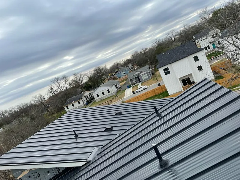 Standing seam metal roof panels with vents for Skylight Repair in Glenwood